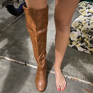 Knee high tan boots. Never worn. Size 8